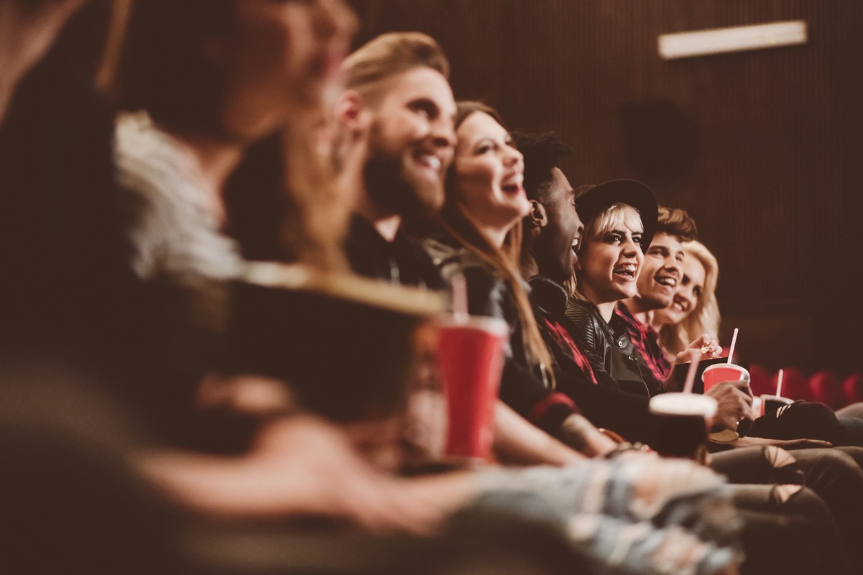 people sitting in a movie theater